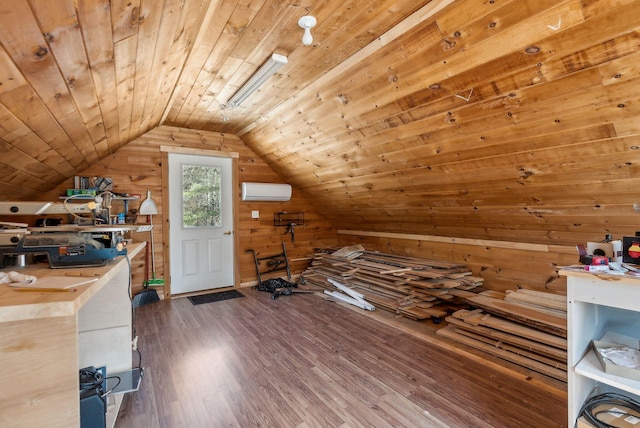 additional living space featuring a wall mounted air conditioner, wood finished floors, wooden walls, wooden ceiling, and vaulted ceiling