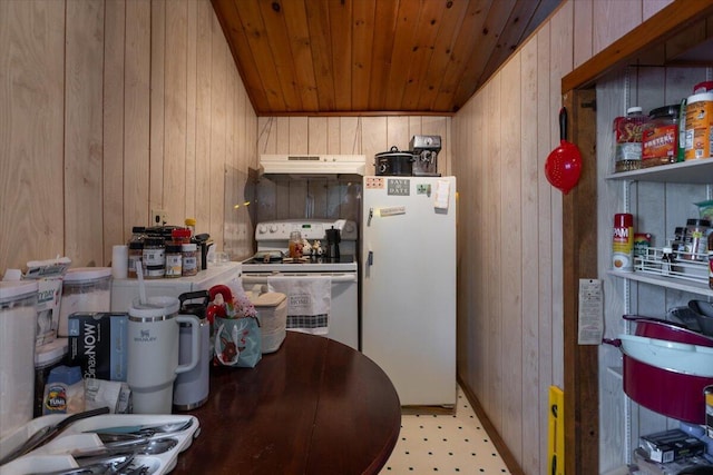 kitchen featuring white appliances, wooden walls, light countertops, under cabinet range hood, and wooden ceiling