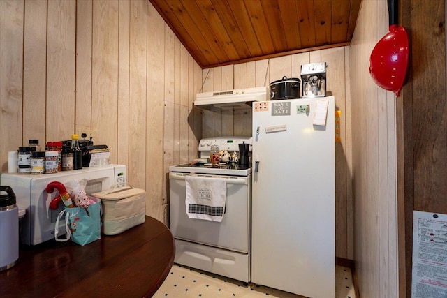 kitchen featuring under cabinet range hood, wood walls, white appliances, and wood ceiling