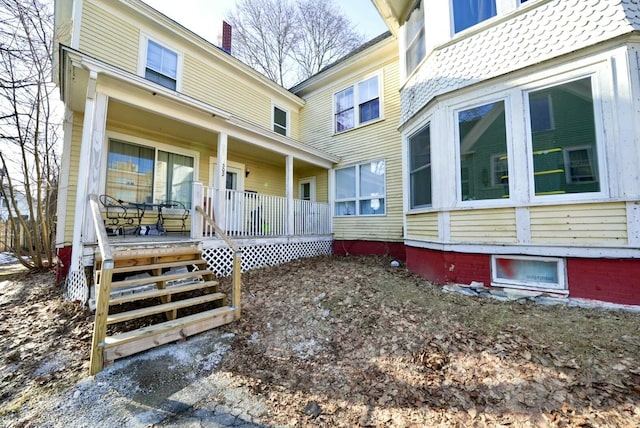 property entrance featuring covered porch