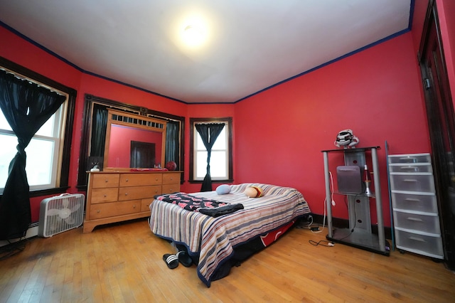 bedroom featuring hardwood / wood-style floors