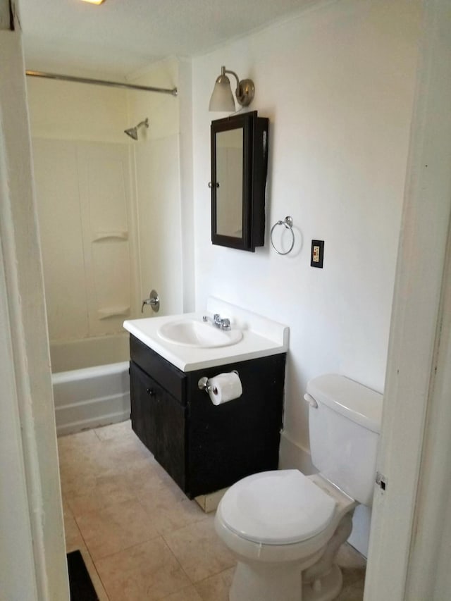 full bathroom with tile patterned flooring, toilet, vanity, and shower / bath combination