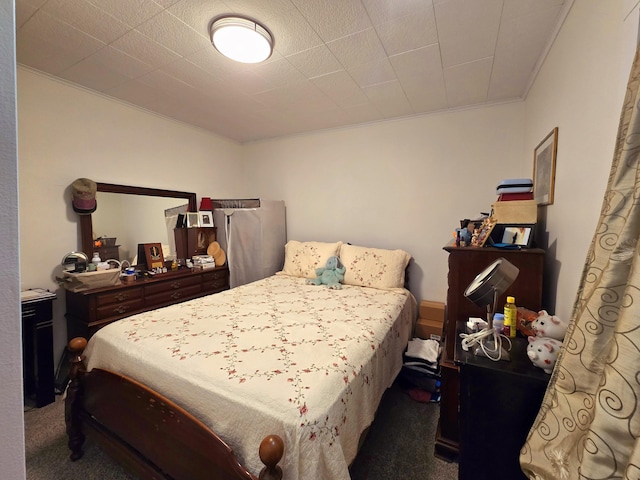 carpeted bedroom featuring ornamental molding