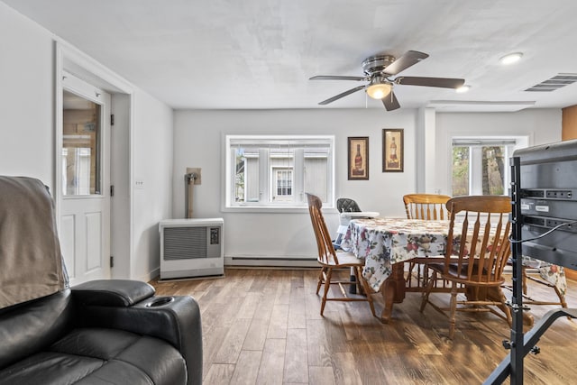 8 Royal Coachman Way, Shapleigh, ME 04076 - dining room featuring a baseboard radiator, wood finished floors, a ceiling fan, and recessed lighting