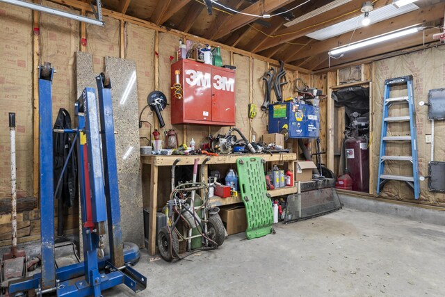 8 Royal Coachman Way, Shapleigh, ME 04076 - below grade area with a workshop area and a garage