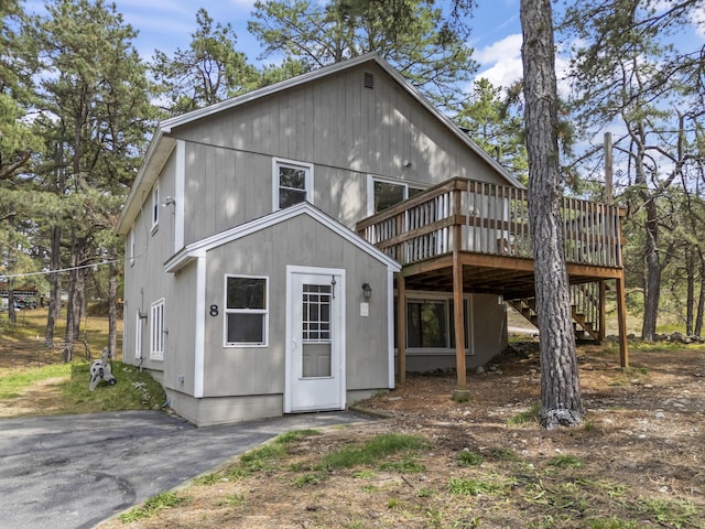 8 Royal Coachman Way, Shapleigh, ME 04076 - back of property featuring a deck and stairs