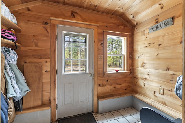 8 Royal Coachman Way, Shapleigh, ME 04076 - entryway featuring vaulted ceiling, wood walls, light tile patterned floors, and wooden ceiling