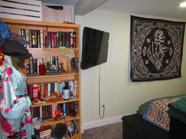 carpeted bedroom with baseboards