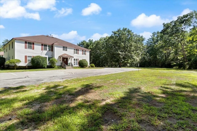 view of front of home with a front yard