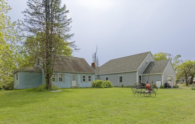 535 Main St, Damariscotta, ME 04543 - back of property featuring a yard and an attached garage