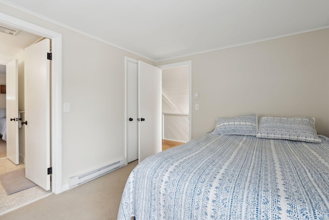 bedroom featuring a baseboard heating unit, a closet, carpet floors, and ornamental molding