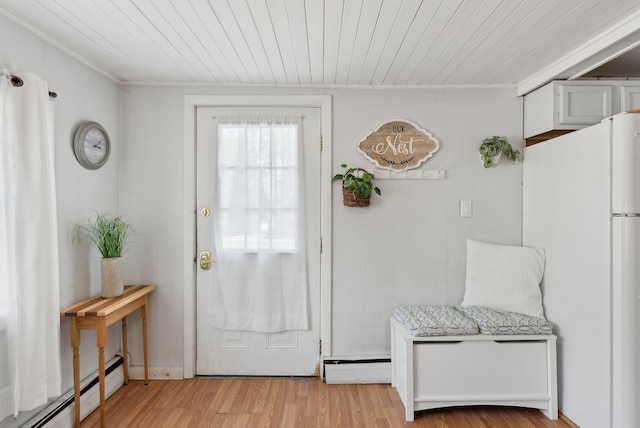 35 Grove Ave, Old Orchard Beach, ME 04064 - doorway to outside featuring wooden ceiling, light wood-type flooring, and baseboard heating