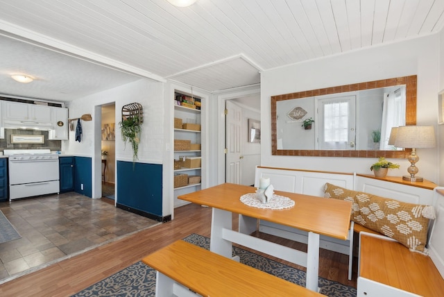 35 Grove Ave, Old Orchard Beach, ME 04064 - dining room featuring wooden ceiling and dark wood-style flooring