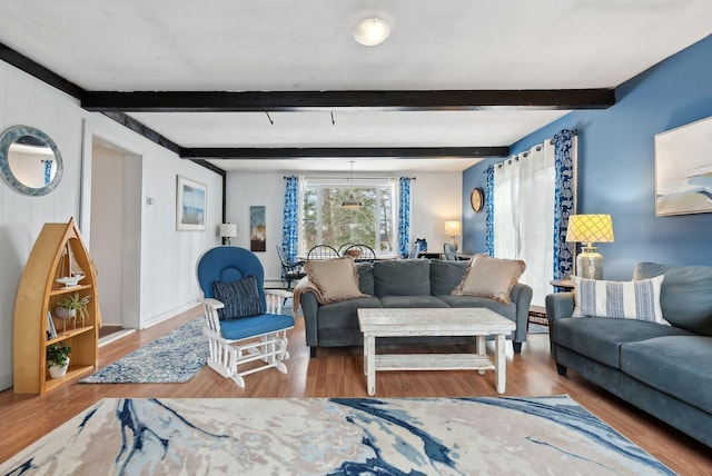 35 Grove Ave, Old Orchard Beach, ME 04064 - living room featuring beamed ceiling and wood finished floors