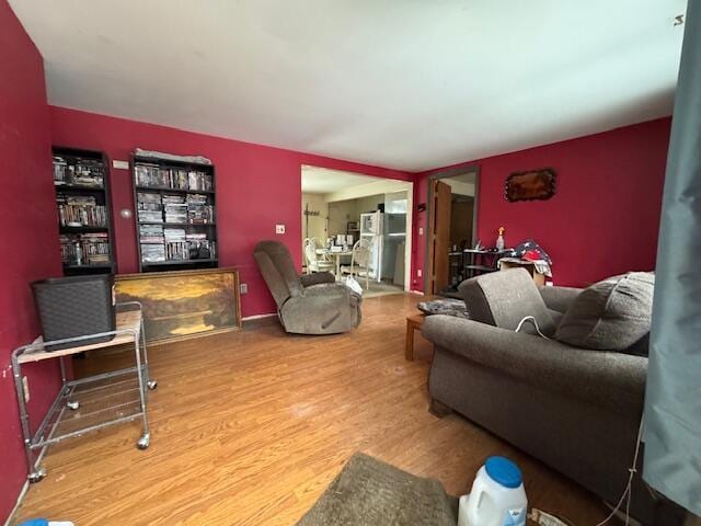 living room with wood finished floors