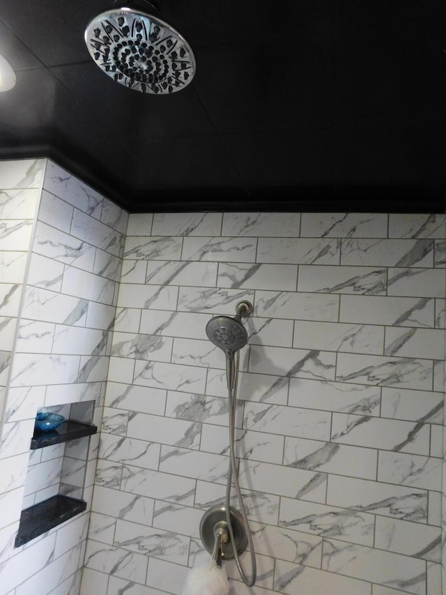 details featuring a tile shower