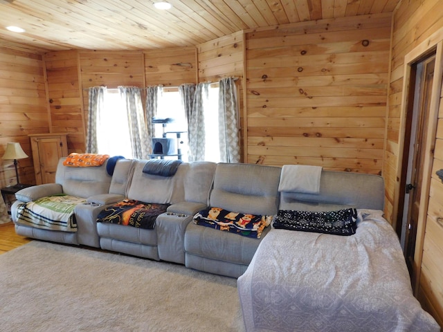 living area with wooden walls, recessed lighting, and wooden ceiling