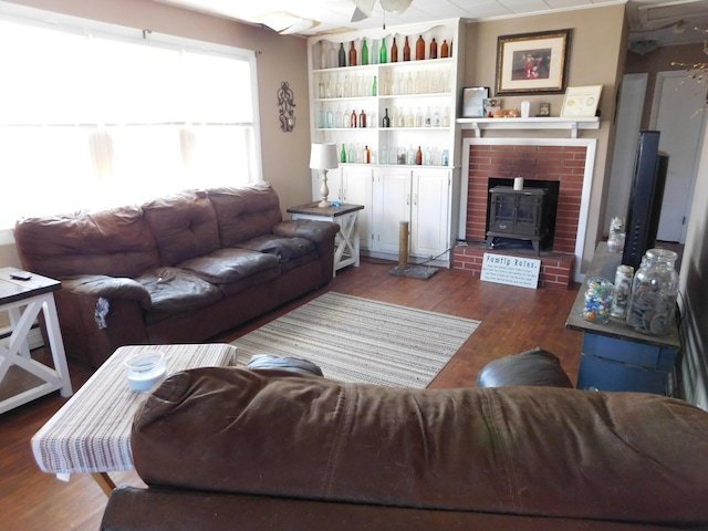 living room with ceiling fan and wood finished floors