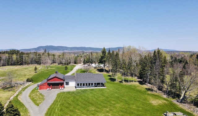 3062 Main St, Rangeley, ME 04970 - aerial view of property and surrounding area featuring a mountain backdrop