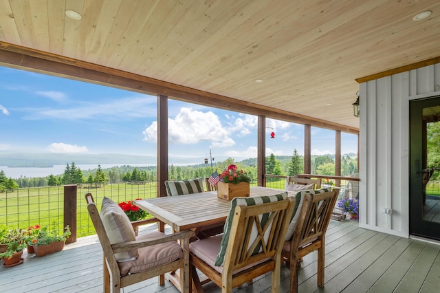 3062 Main St, Rangeley, ME 04970 - sunroom with wooden ceiling, wood-type flooring, a wooden deck, and recessed lighting