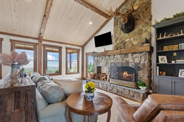 3062 Main St, Rangeley, ME 04970 - living area with wooden ceiling and a fireplace