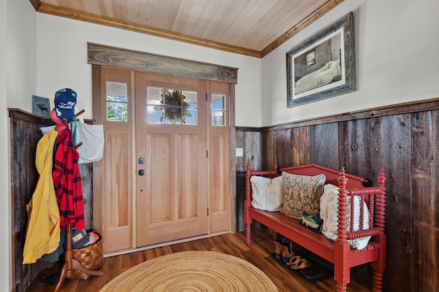 3062 Main St, Rangeley, ME 04970 - foyer featuring a wainscoted wall, wood finished floors, crown molding, and wooden ceiling