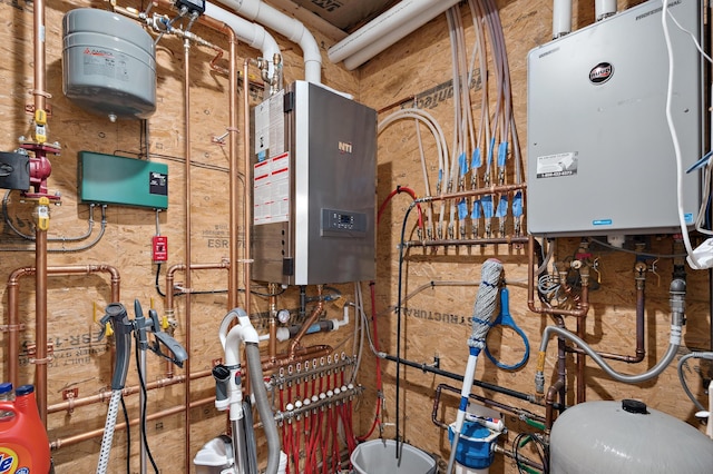 3062 Main St, Rangeley, ME 04970 - utility room featuring water heater