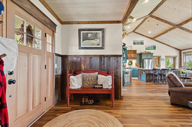 3062 Main St, Rangeley, ME 04970 - entrance foyer with light wood finished floors, wood ceiling, and crown molding