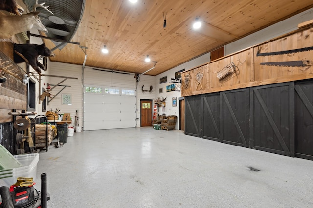 3062 Main St, Rangeley, ME 04970 - garage featuring wooden ceiling