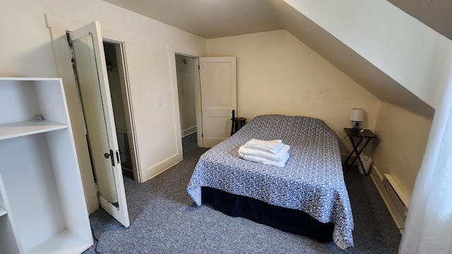 bedroom with baseboards, carpet floors, and baseboard heating