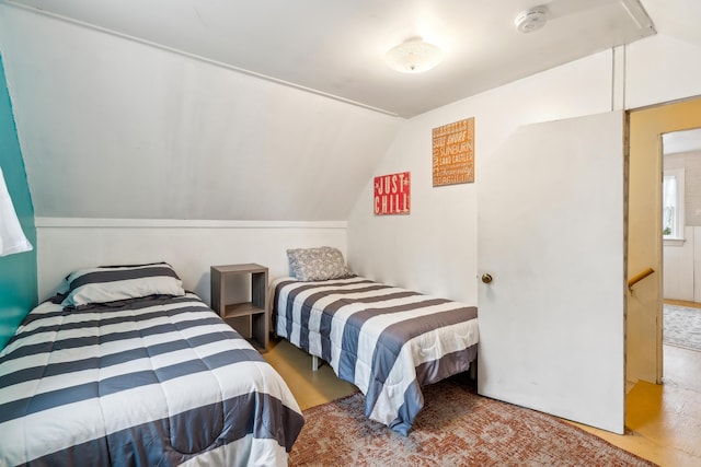 bedroom with vaulted ceiling