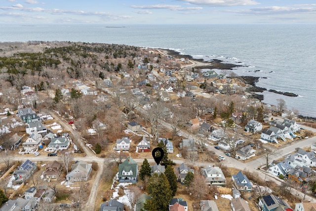 drone / aerial view featuring a residential view and a water view