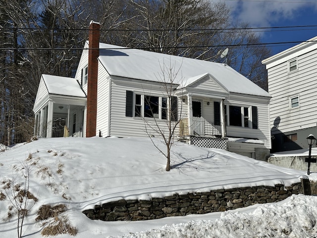 view of front of property with a chimney