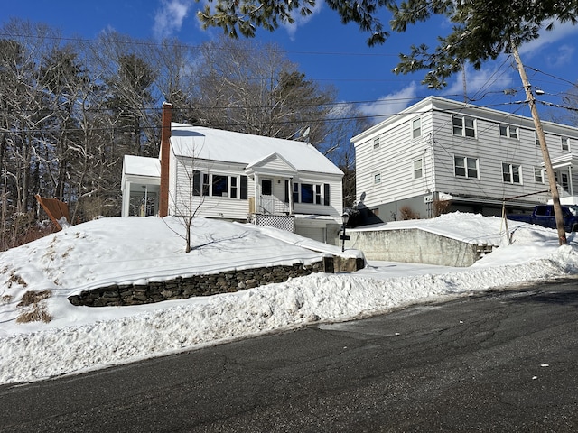 view of front of home with a chimney