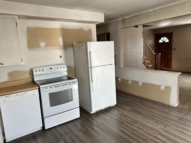 kitchen featuring white appliances and dark wood-style floors