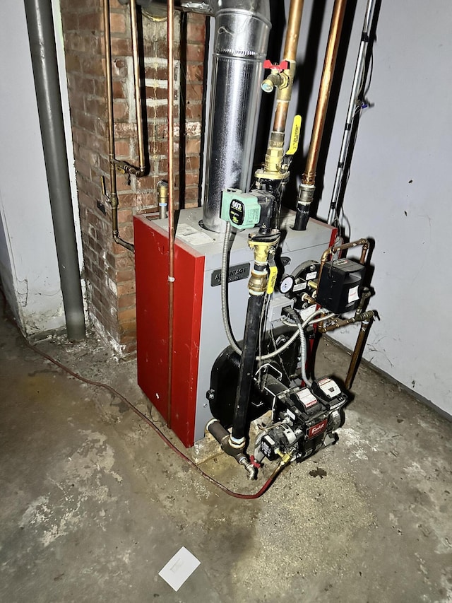 utility room featuring a heating unit