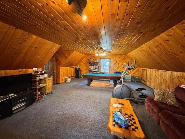 rec room featuring billiards, wooden walls, wooden ceiling, and carpet floors