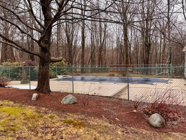 view of pool with fence