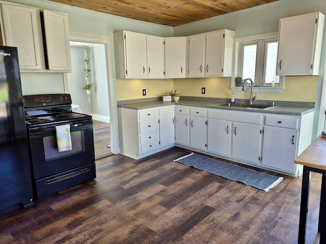kitchen with dark wood-style flooring, a sink, wooden ceiling, white cabinets, and black appliances