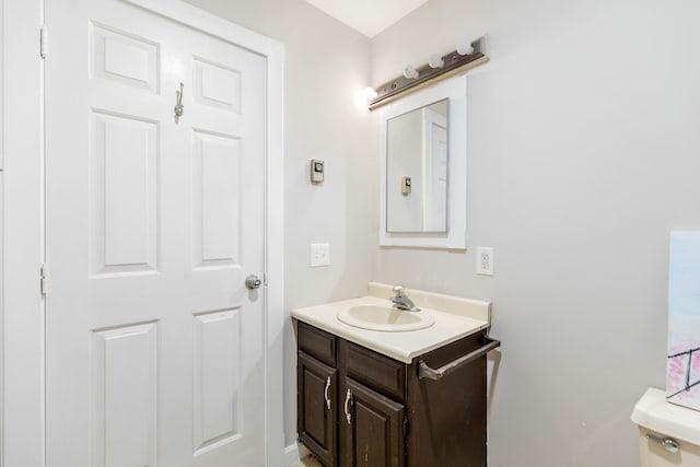 half bath with toilet and vanity