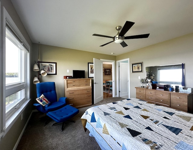 68 Robbins St, Robbinston, ME 04671 - bedroom with baseboards, ceiling fan, and carpet floors