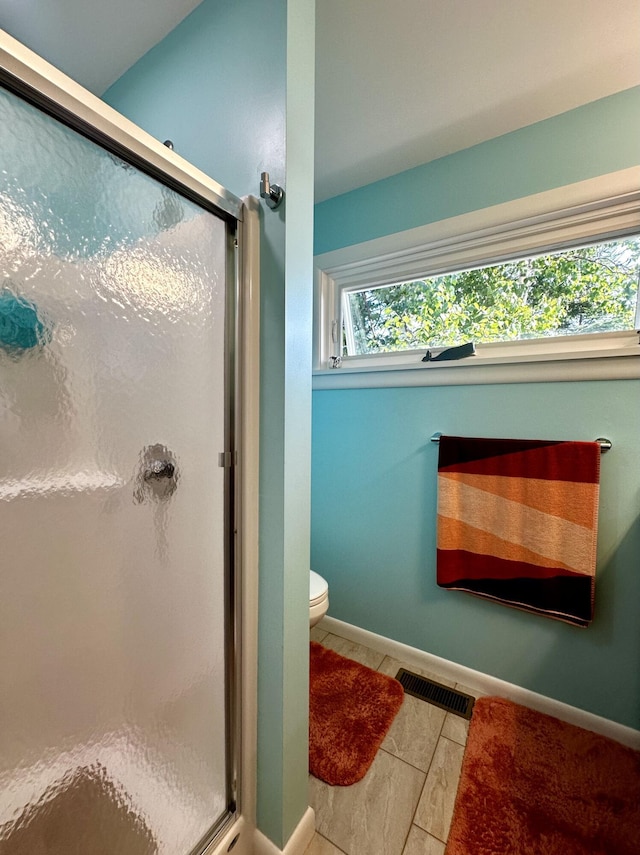 68 Robbins St, Robbinston, ME 04671 - full bath with visible vents, baseboards, and a stall shower