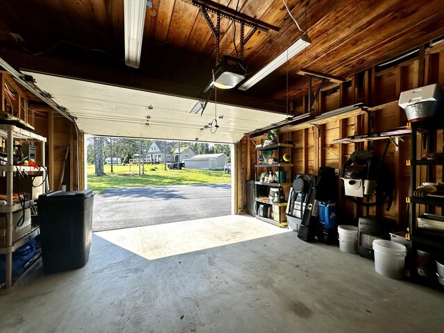 68 Robbins St, Robbinston, ME 04671 - garage with a garage door opener