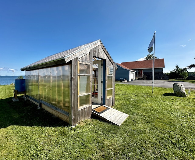 68 Robbins St, Robbinston, ME 04671 - view of greenhouse featuring a yard