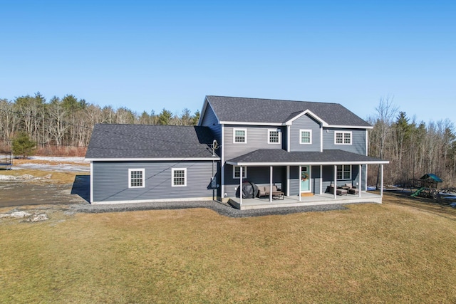 63 Grandview Dr, Newport, ME 04953 - rear view of property featuring a patio area, a shingled roof, and a yard