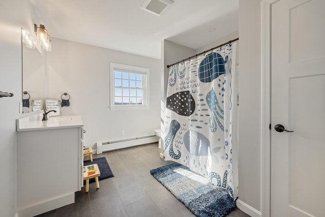 63 Grandview Dr, Newport, ME 04953 - bathroom with a baseboard heating unit, vanity, a shower with curtain, toilet, and visible vents