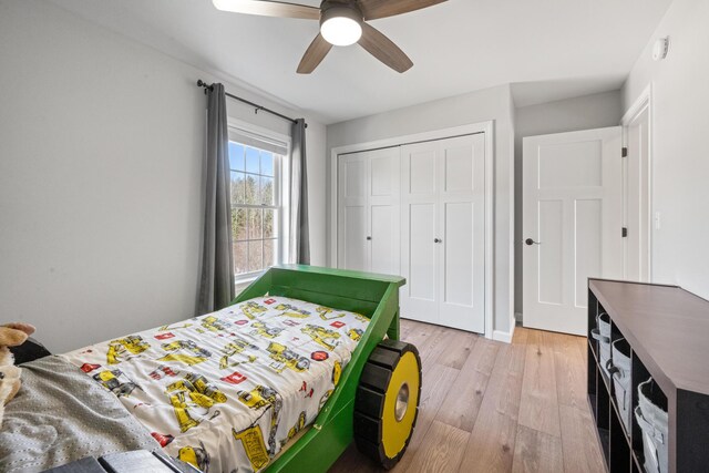 63 Grandview Dr, Newport, ME 04953 - bedroom featuring light wood-type flooring, a closet, and a ceiling fan