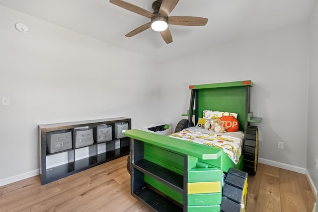 63 Grandview Dr, Newport, ME 04953 - bedroom with baseboards, a ceiling fan, and wood finished floors