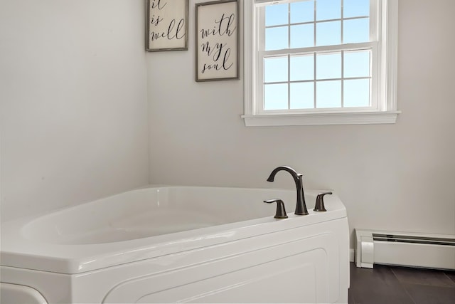 63 Grandview Dr, Newport, ME 04953 - bathroom with baseboard heating and a bath