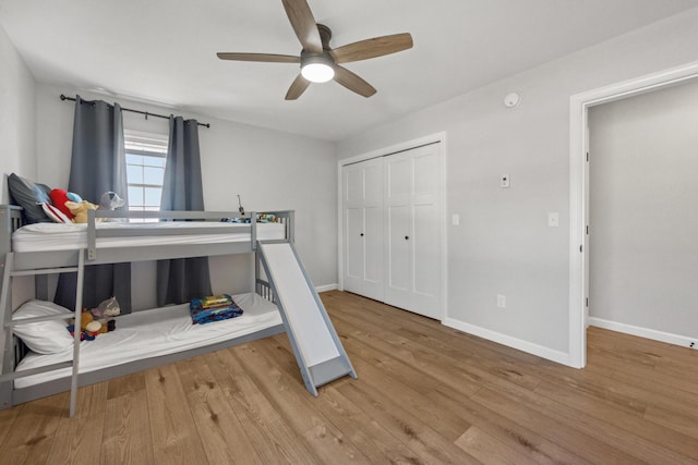 63 Grandview Dr, Newport, ME 04953 - bedroom featuring wood finished floors, a closet, baseboards, and ceiling fan